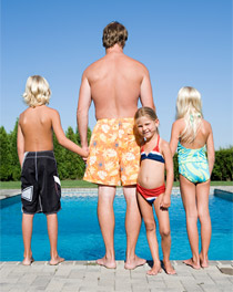athlete-1 Photo of family standing on pool deck